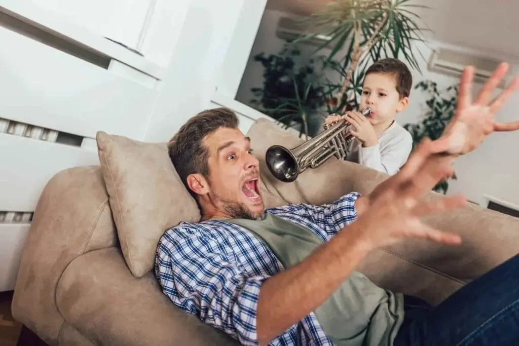 Playing the trumpet to wake someone up