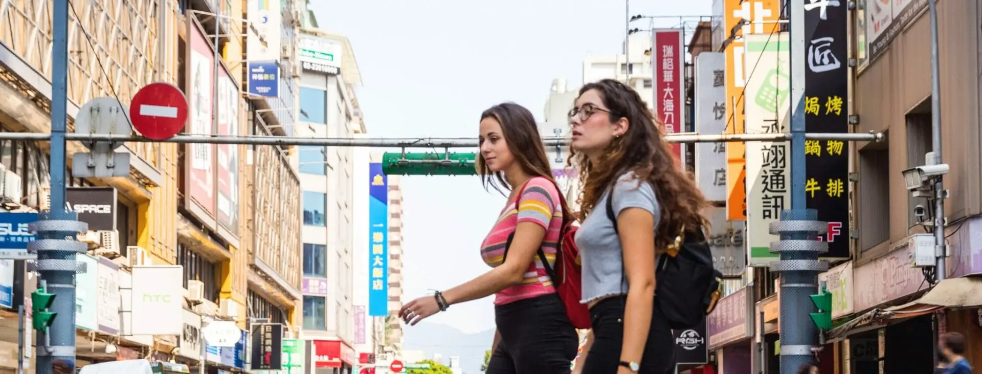 pros and cons of studying abroad source canva