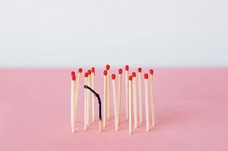 Matchsticks on Pink Surface