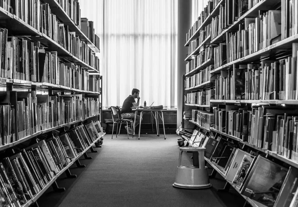 man studying in library