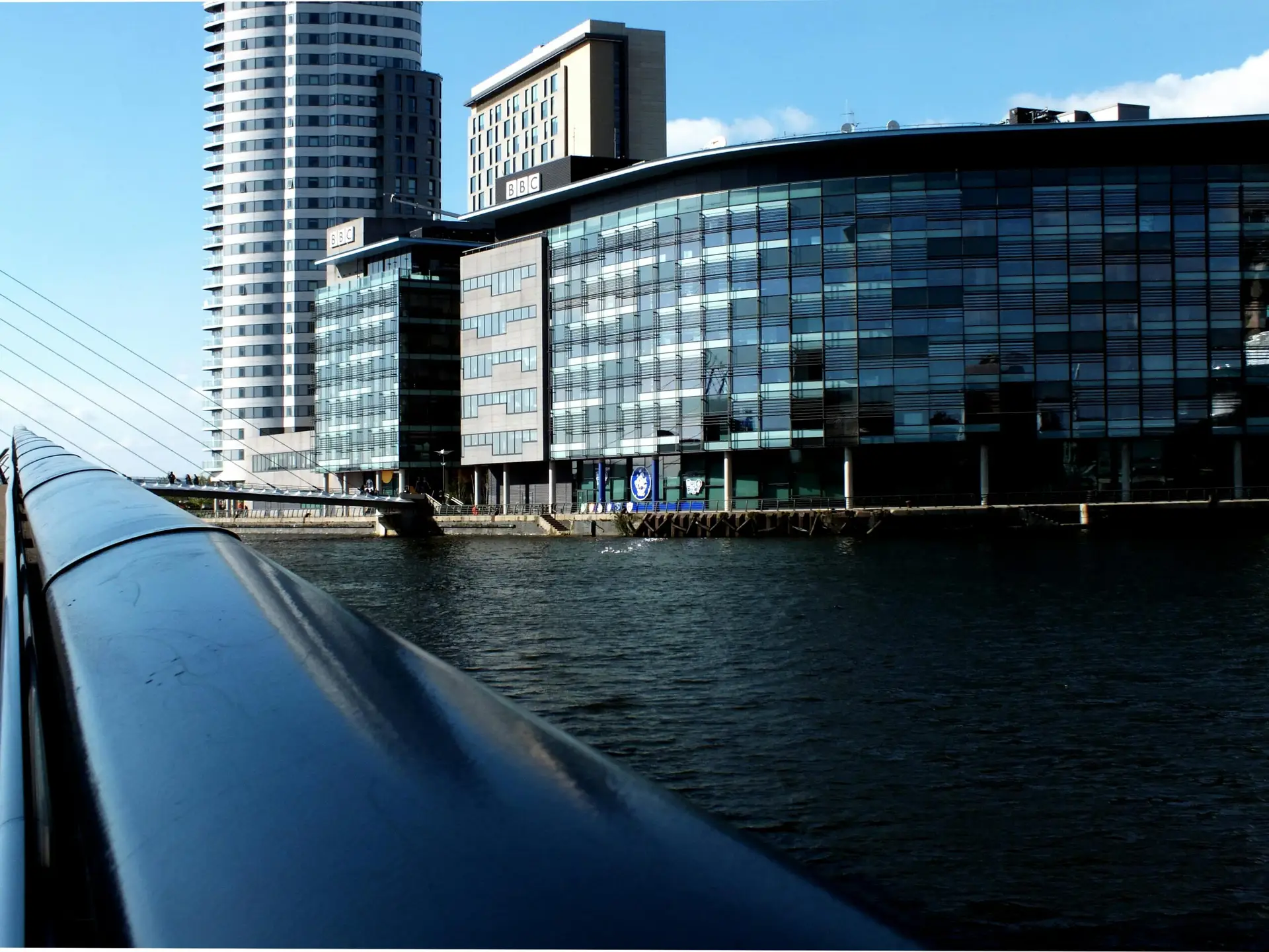 MediaCityUK buildings at Salford Quays reflected on the water