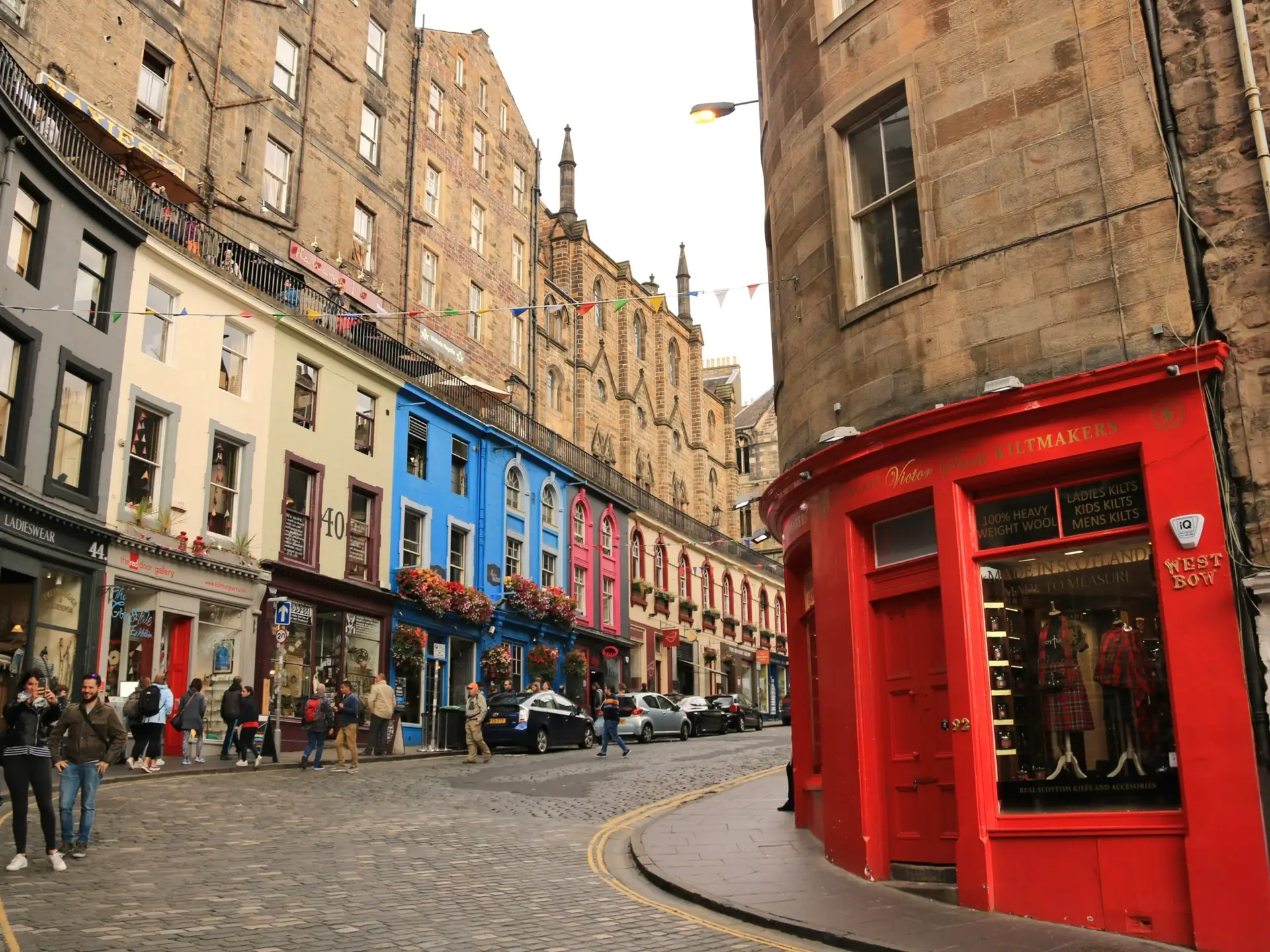 Colourful shopfronts on Victoria Street in Edinburgh's Old Town