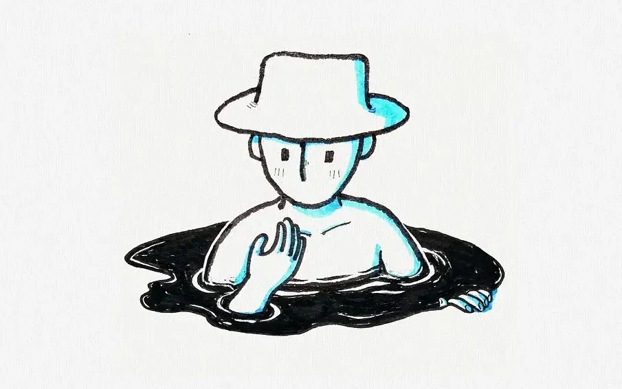A man in a black pool contemplating his own hand in front of his face. He is wearing a hat.