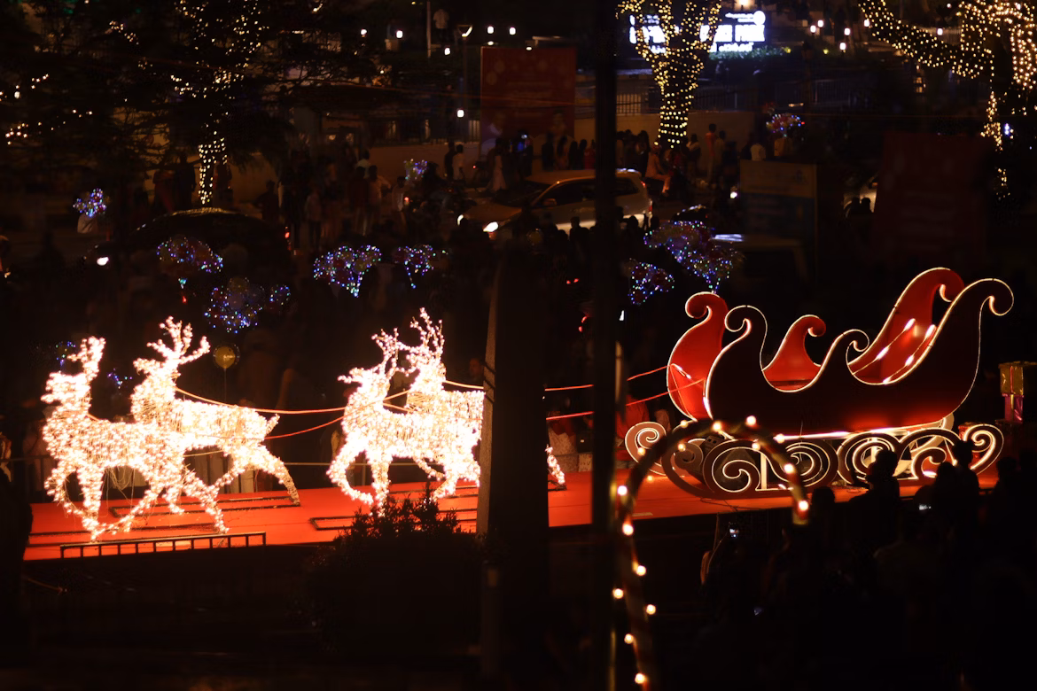 Santa's sleigh being pulled by illuminated reindeers