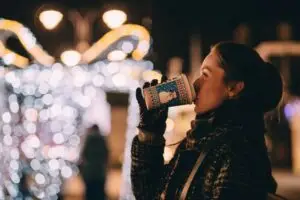 Woman drinking festive drink