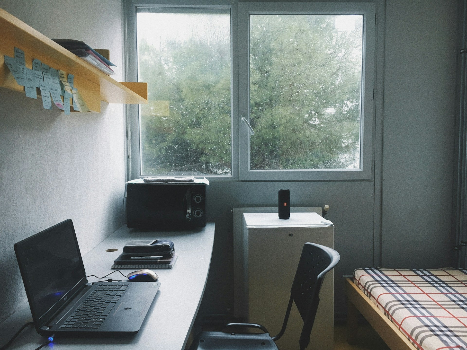 Student studying in a premium studio apartment