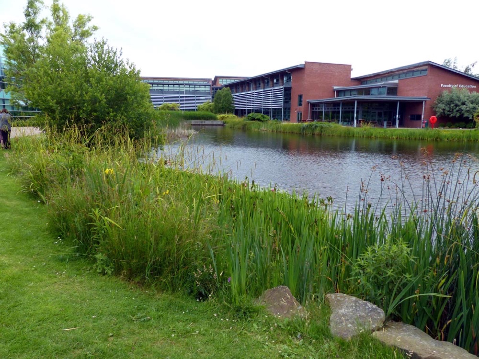 Lake and modern buildings on the Edge Hill University campus in Ormskirk