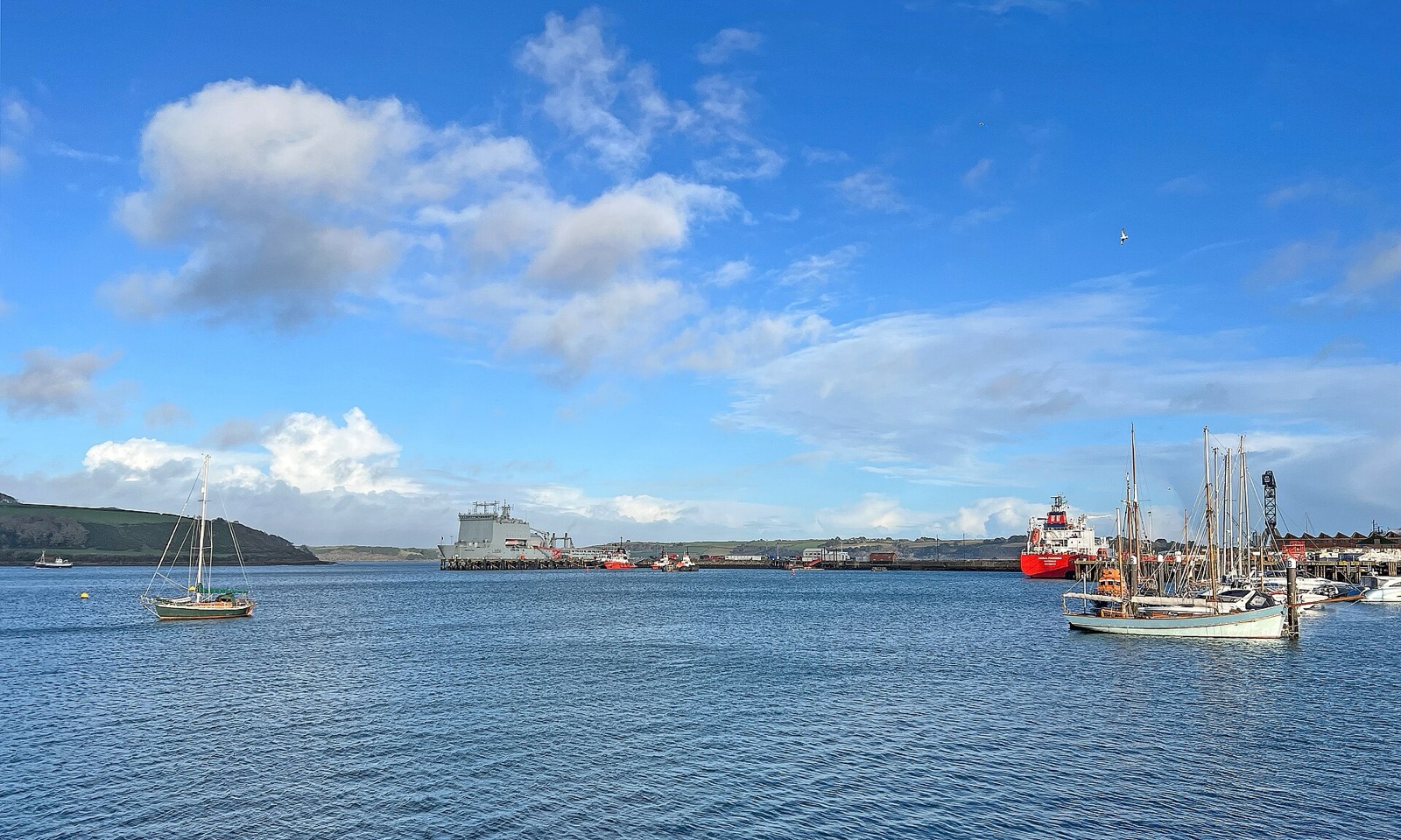 Boats on Falmouth Harbour under a blue sky