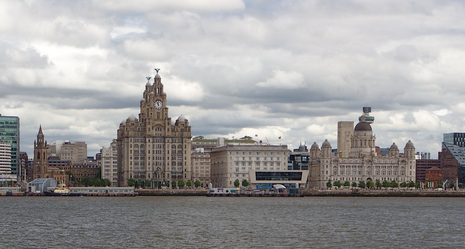 The Three Graces on Liverpool's Pier Head waterfront seen across the River Mersey
