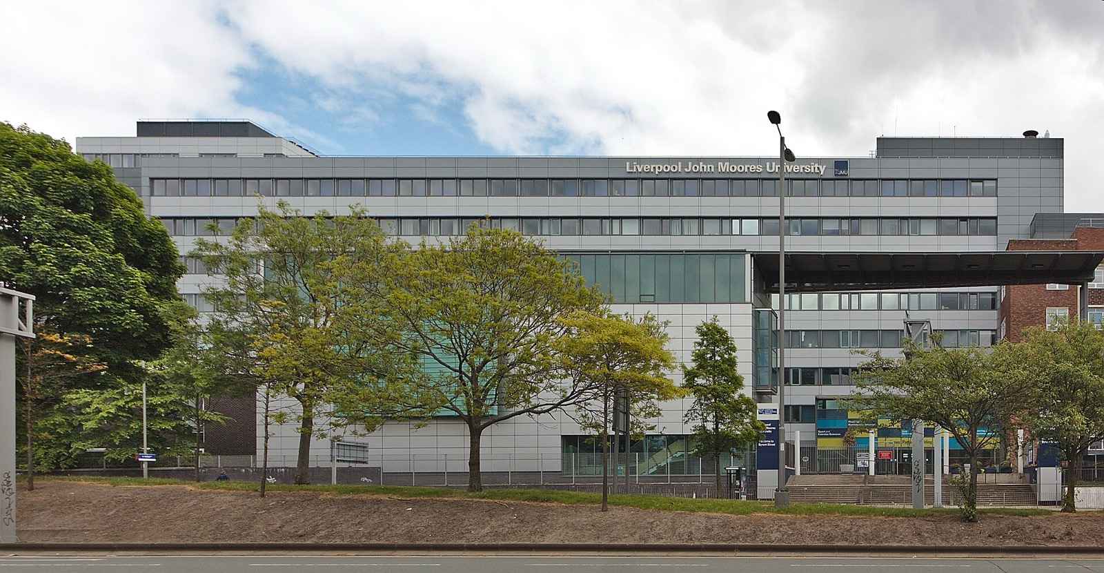 Liverpool John Moores University buildings on Byrom Street behind green trees