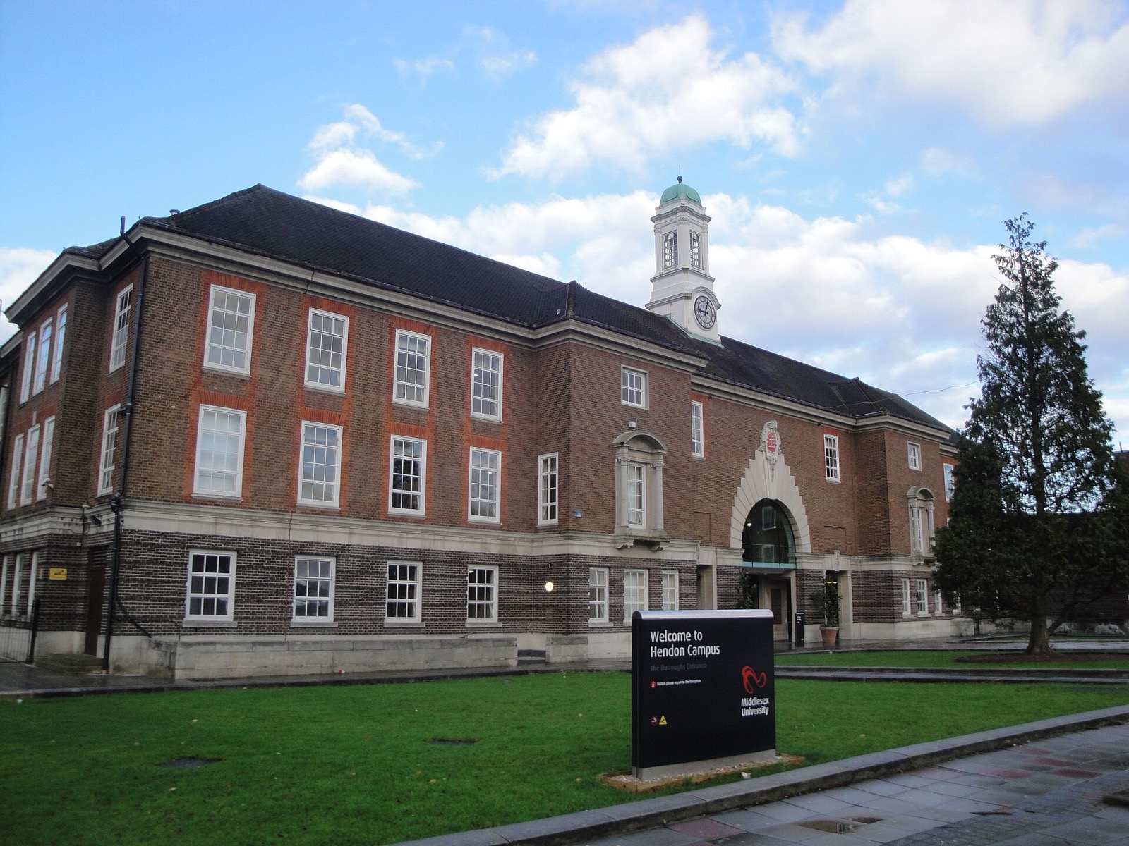 The red-brick Grove building and clock tower at Middlesex University's Hendon campus