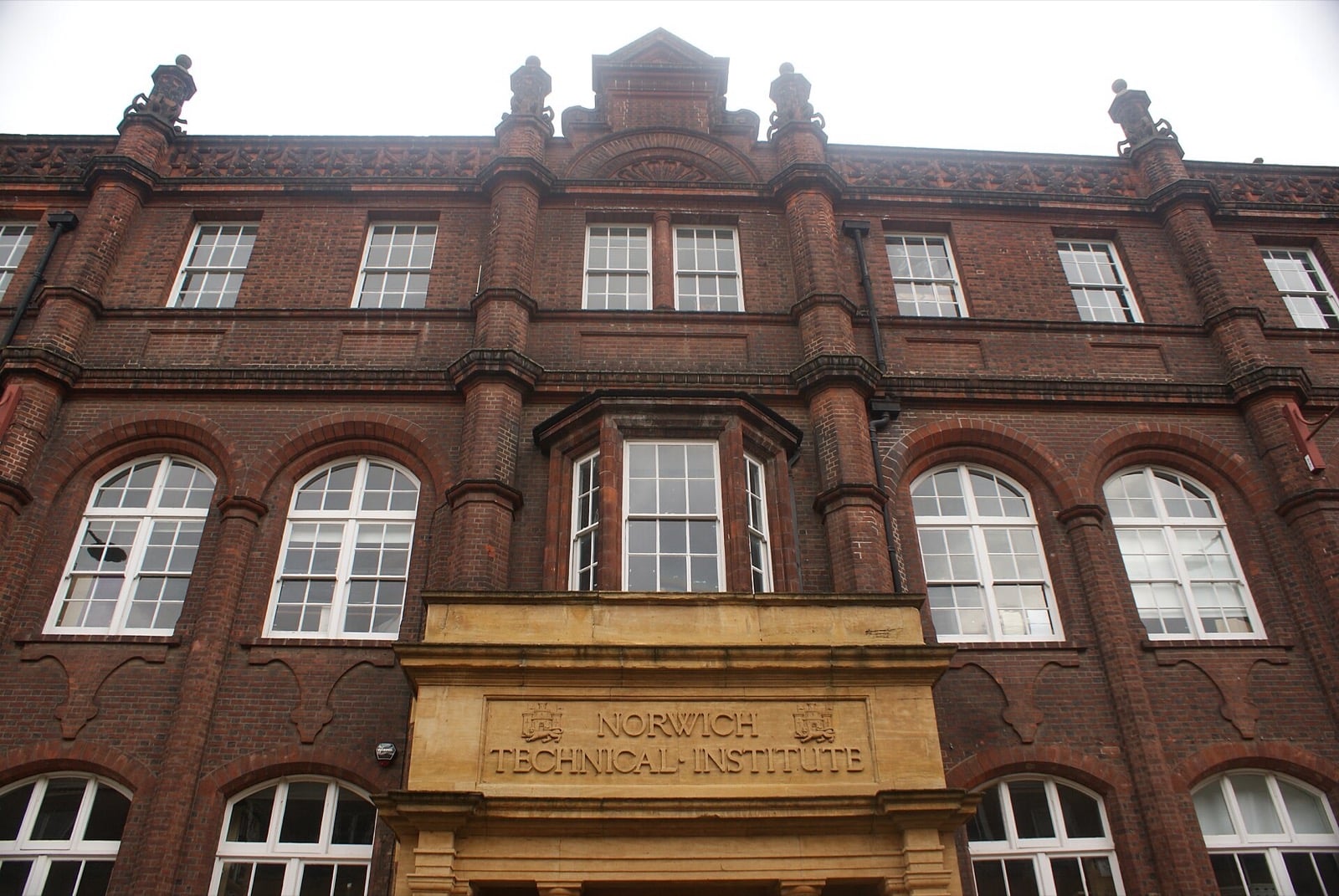 Red-brick Victorian facade of Norwich University of the Arts in Norwich city centre