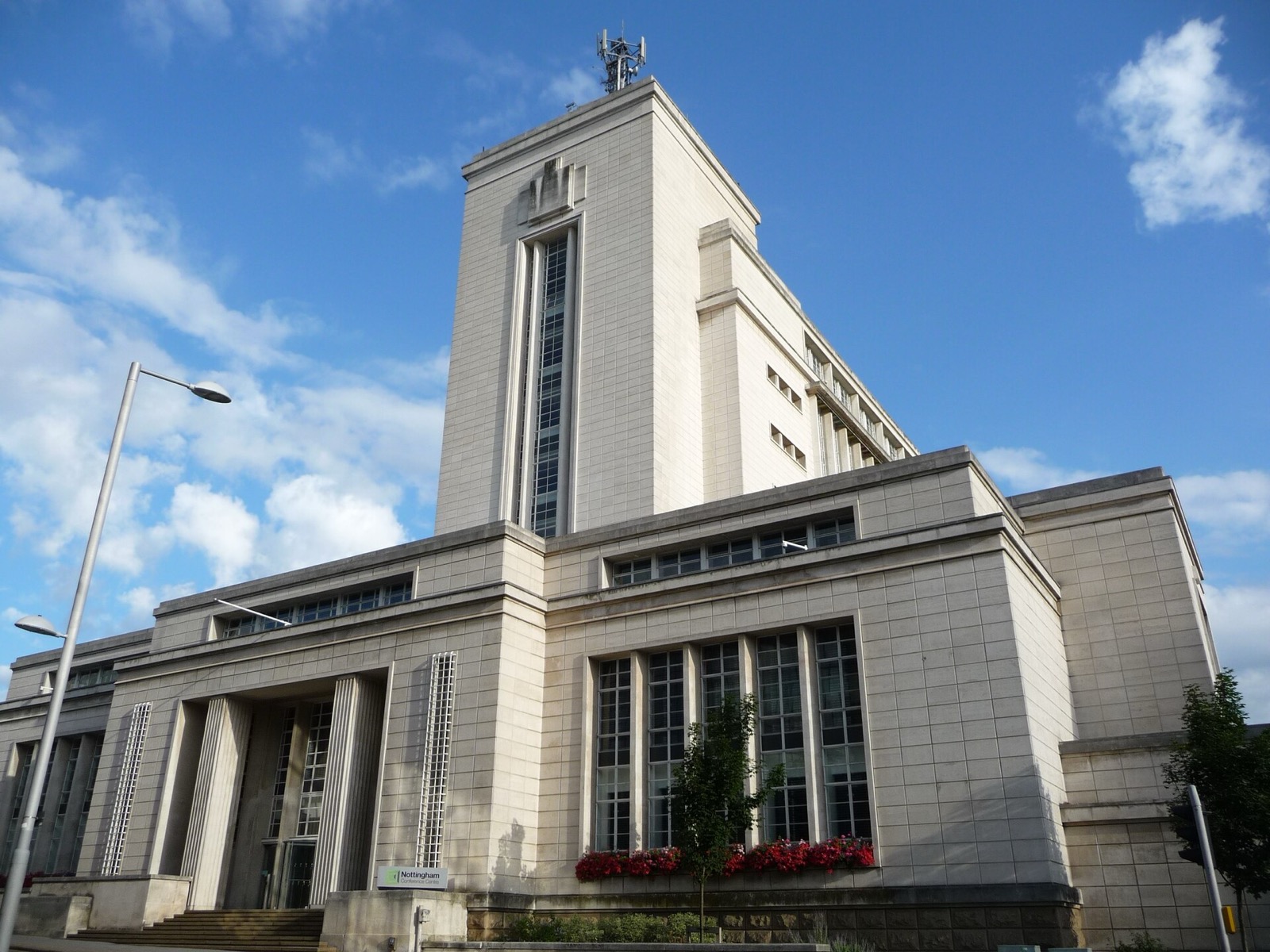 The Art Deco Newton Building of Nottingham Trent University under a blue sky