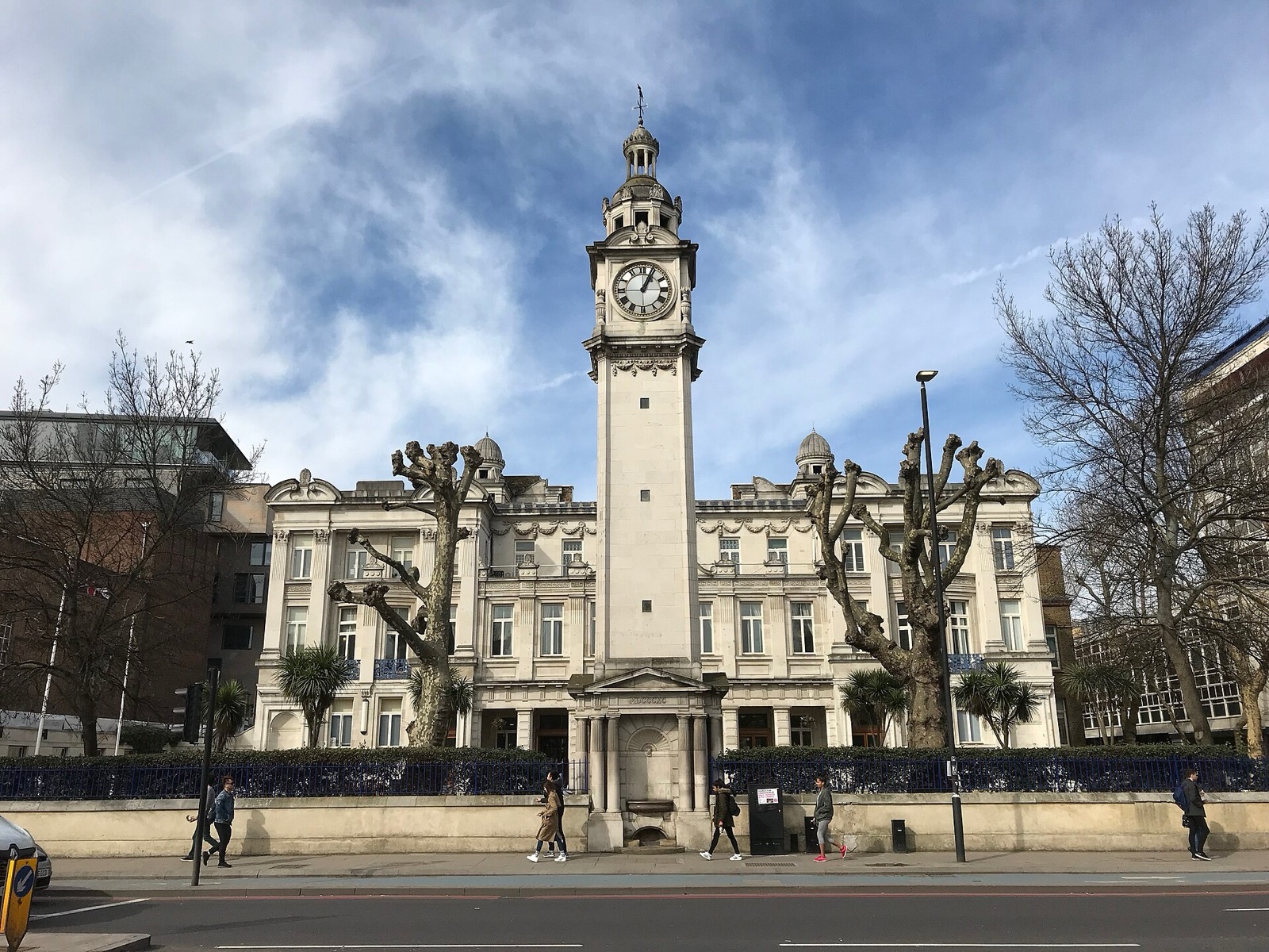 The Queens' Building clock tower at Queen Mary University of London on Mile End Road