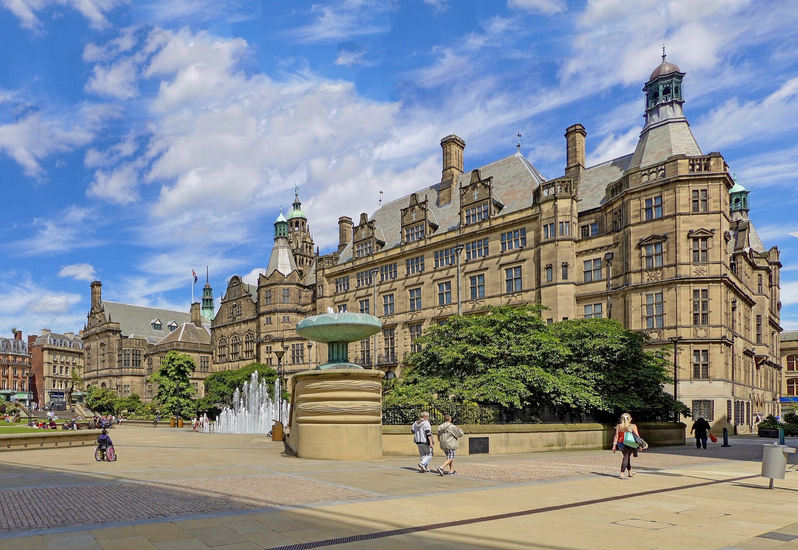 Sheffield Town Hall and the Peace Gardens under a blue sky
