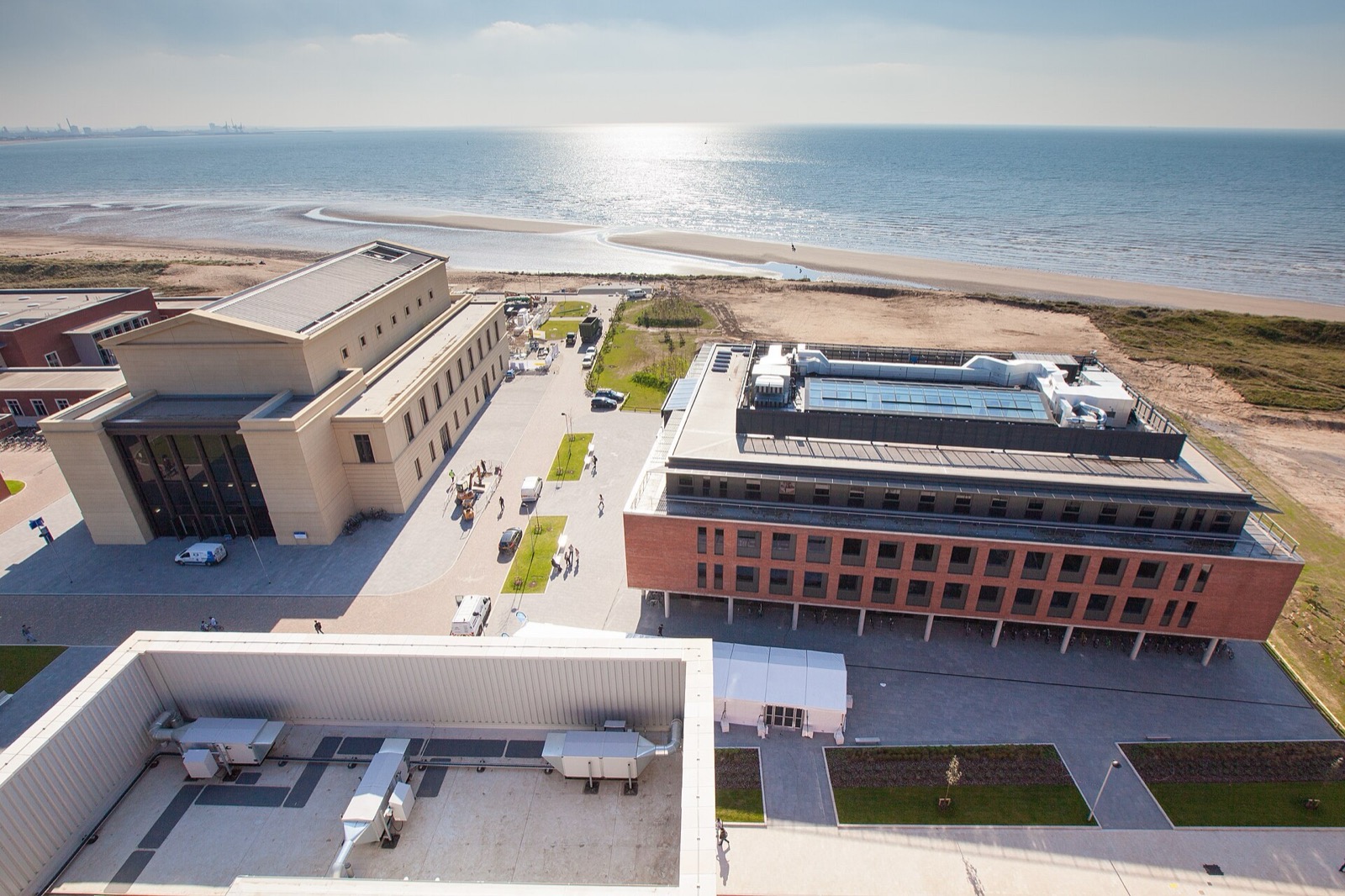 Aerial view of Swansea University's Bay Campus buildings beside the beach