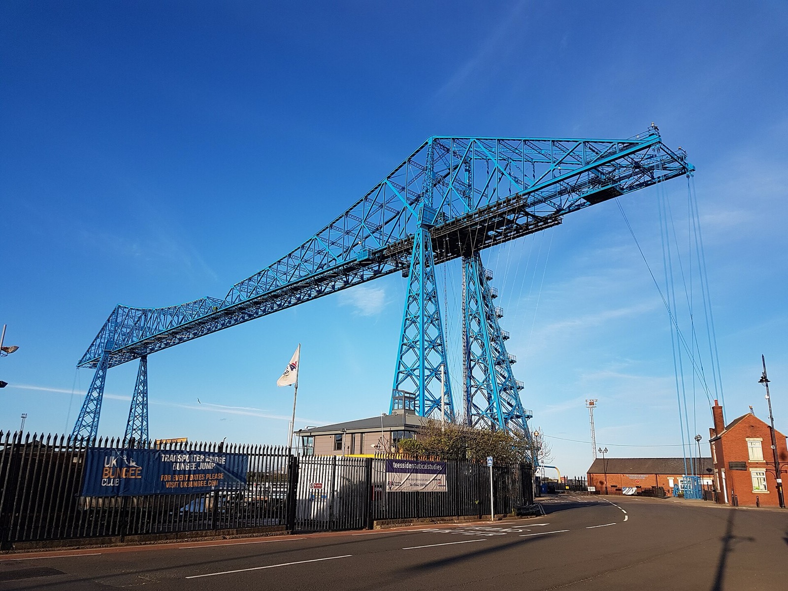 The blue Tees Transporter Bridge in Middlesbrough under a clear sky
