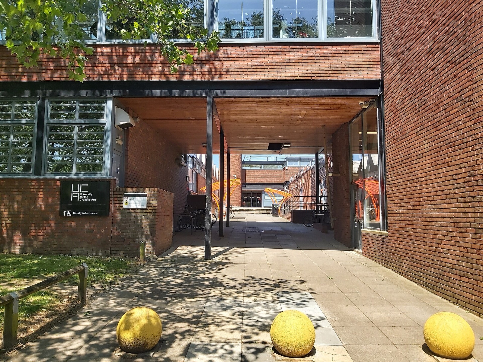Entrance walkway at the University for the Creative Arts campus in Farnham