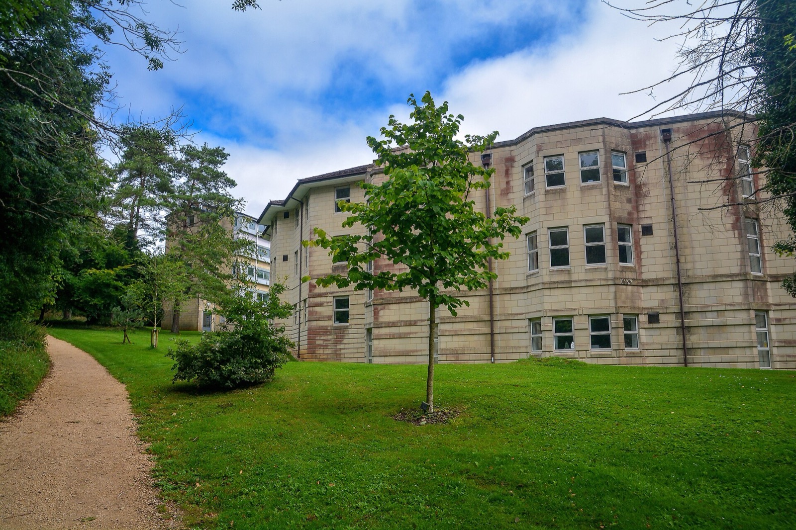 University of Bath campus buildings among trees and lawns at Claverton Down