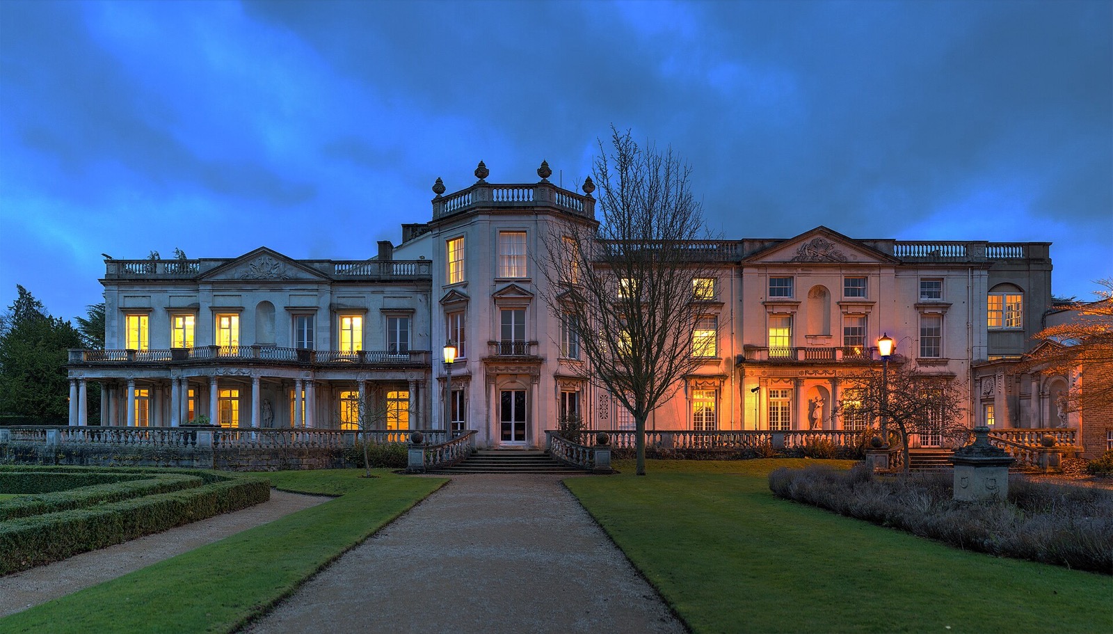 Grove House at the University of Roehampton, lit up at dusk