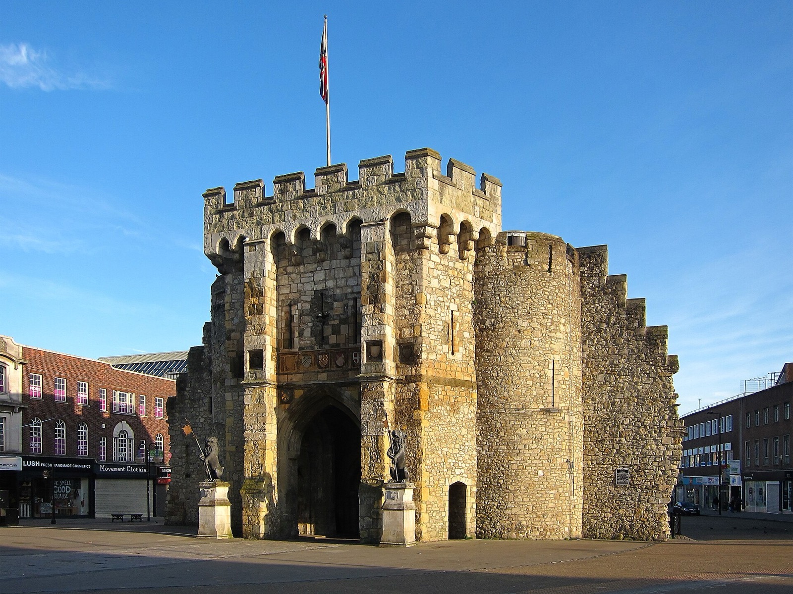 The medieval Bargate gatehouse in Southampton city centre under a clear blue sky