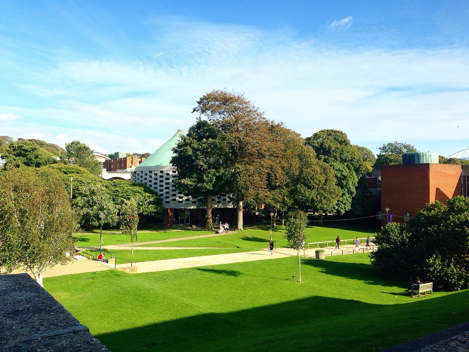 Green lawns and buildings on the University of Sussex Falmer campus