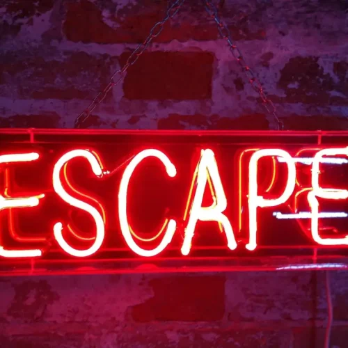 Neon-red 'escape' sign