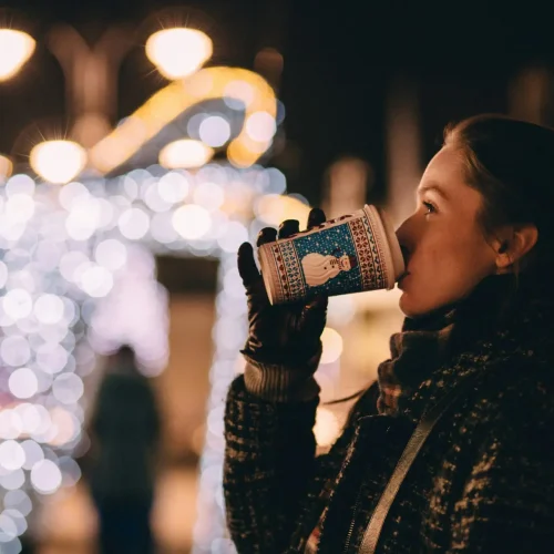 Woman drinking festive drink