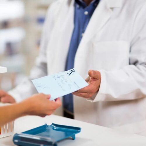 Do university students pay for prescriptions?